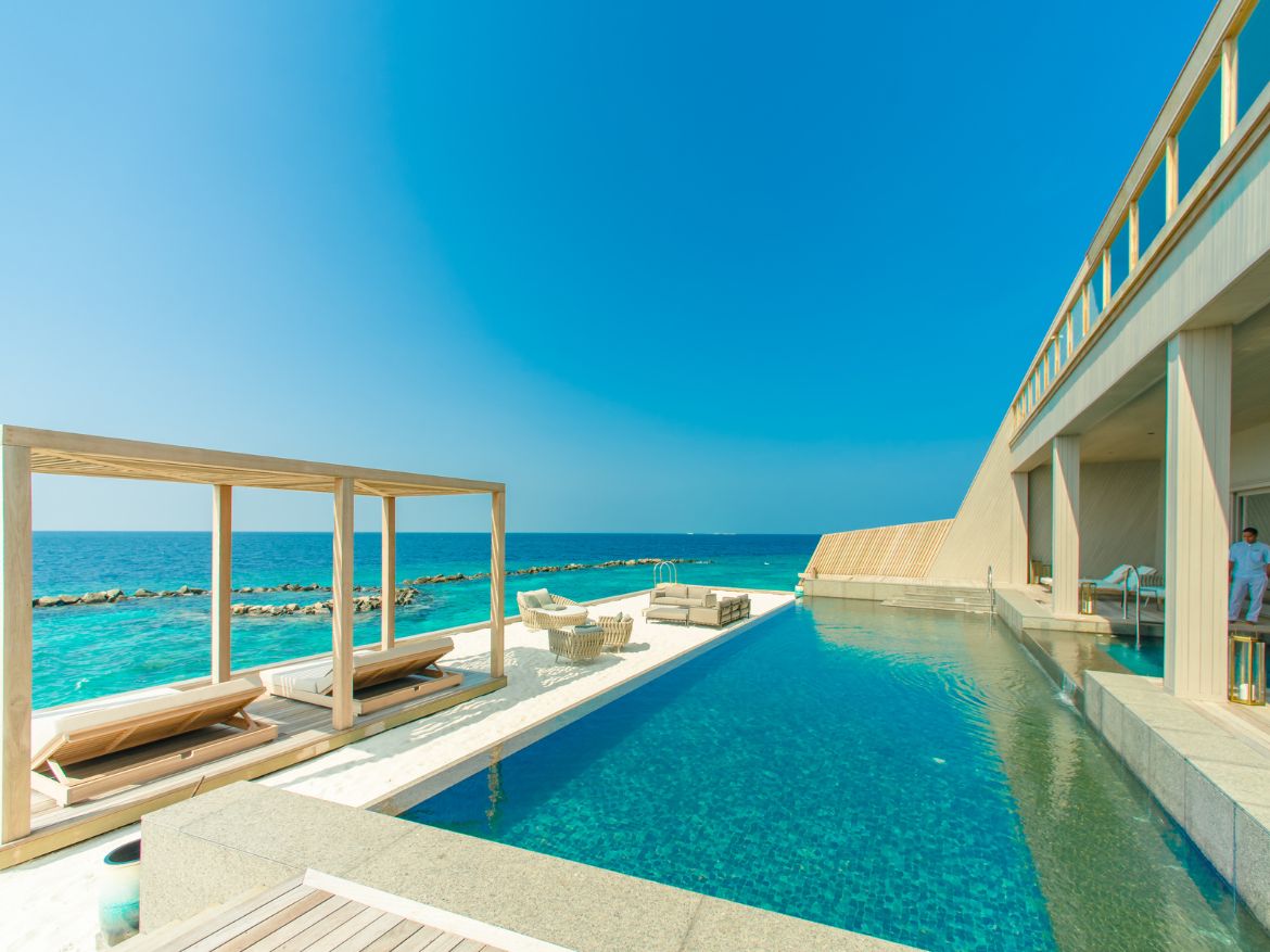 Buying a home in Trinidad – young Caribbean couple viewing a modern house